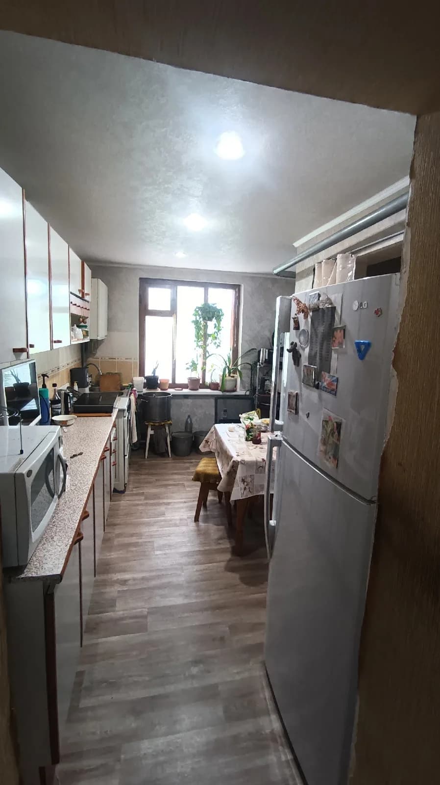 дом по ул. Коммунистической, пос.Октябрьский, район ДК